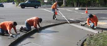 Worker do sidewalk replacement in NYC