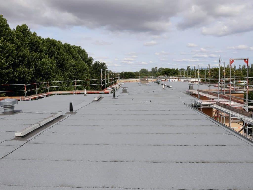 Flat roof general contractor near me by Mason General Contracting Corp